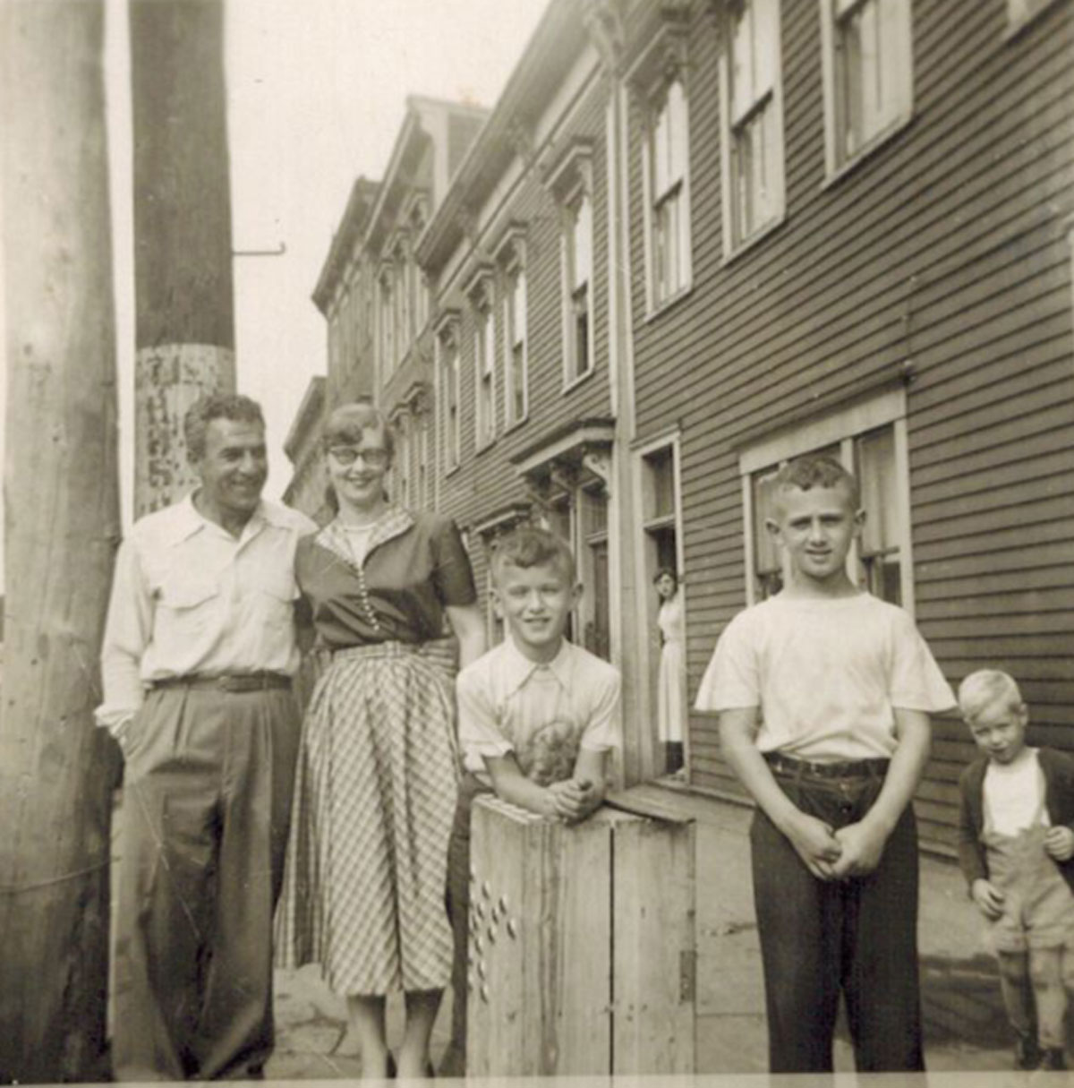 Photograph of M. Fred Tobias, Laura Tobias, Ken Tobias, and Tony Tobias.